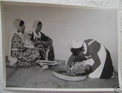 ISRAEL REAL PHOTO NURSE GUIDE ARAB WOMEN BABY CARE 50s