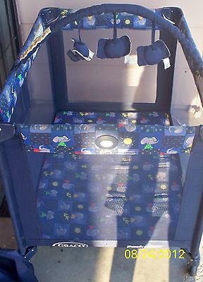 Graco Port a crib, play pen bassinet, changing station and mobile FREE 