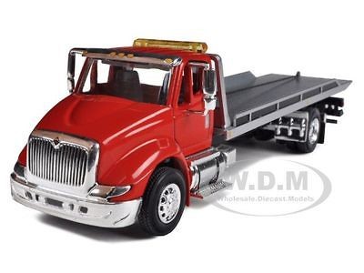 INTERNATIONAL 8600 RED CAB TOW TRUCK WITH ROLLBACK BED 1/64 SPECCAST 