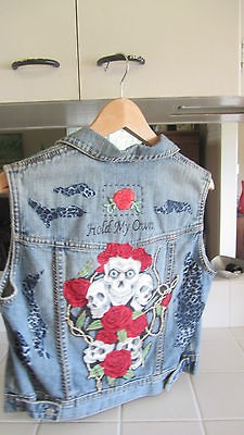 Womens custom denim vest with rhinestones, skull print chains, studs 