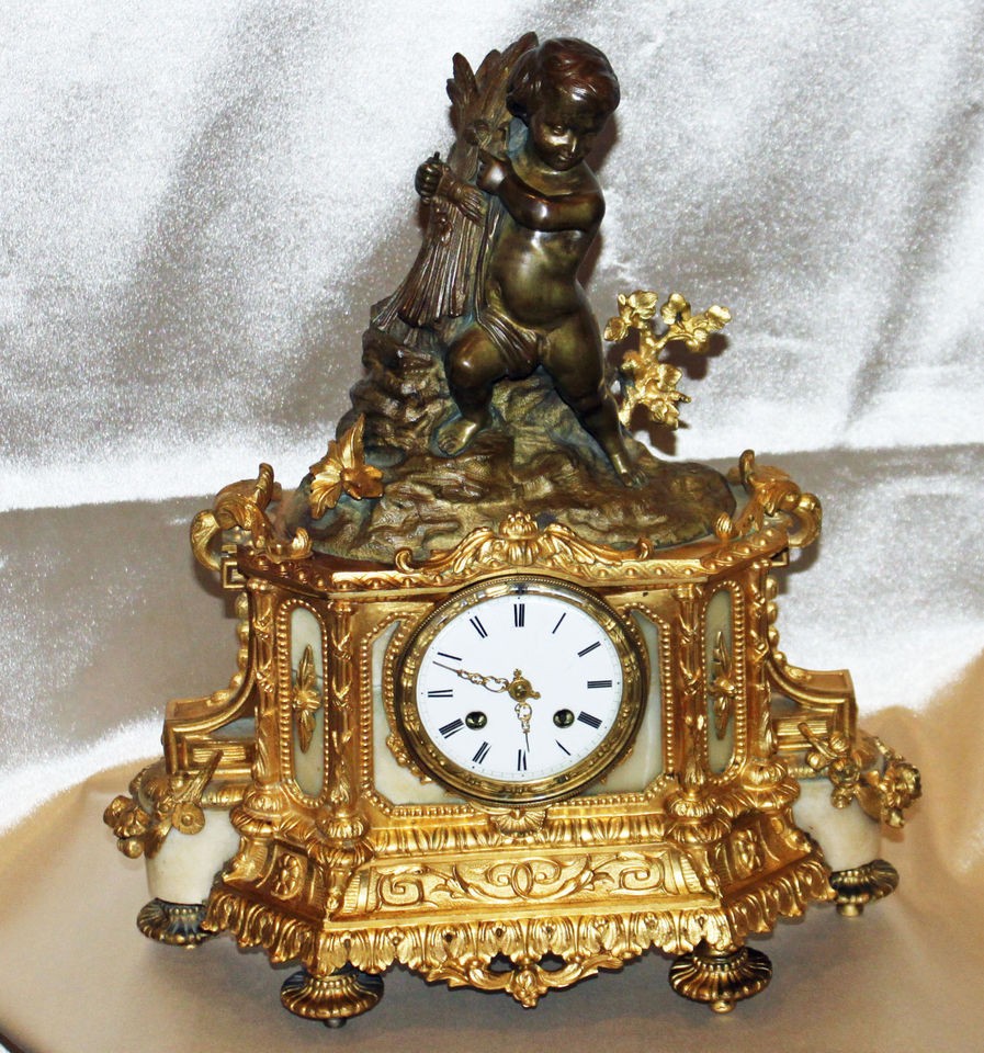 MANTEL CLOCK 19 C FRENCH BRONZE & ONYX BOY HOLDING WHEATS & GILT 