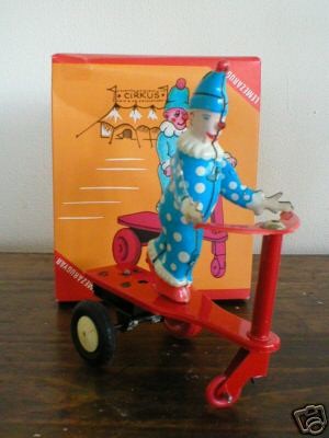 ANTIQUE ROLI ZOLI CIRKUS CLOWN SCOOTER W/MOVABLE WHEEL