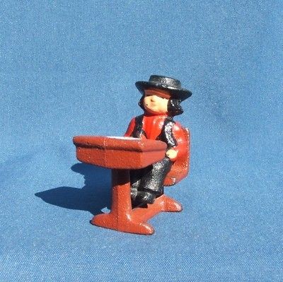 VINTAGE CAST IRON AMISH BOY AT SCHOOL DESK