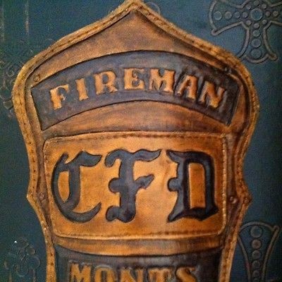 Custom Hand Tooled Leather Fire Helmet Shield