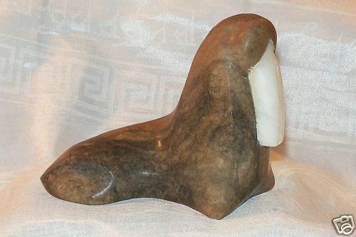 vintage carved all stone walrus w inlaid quartz tusk time