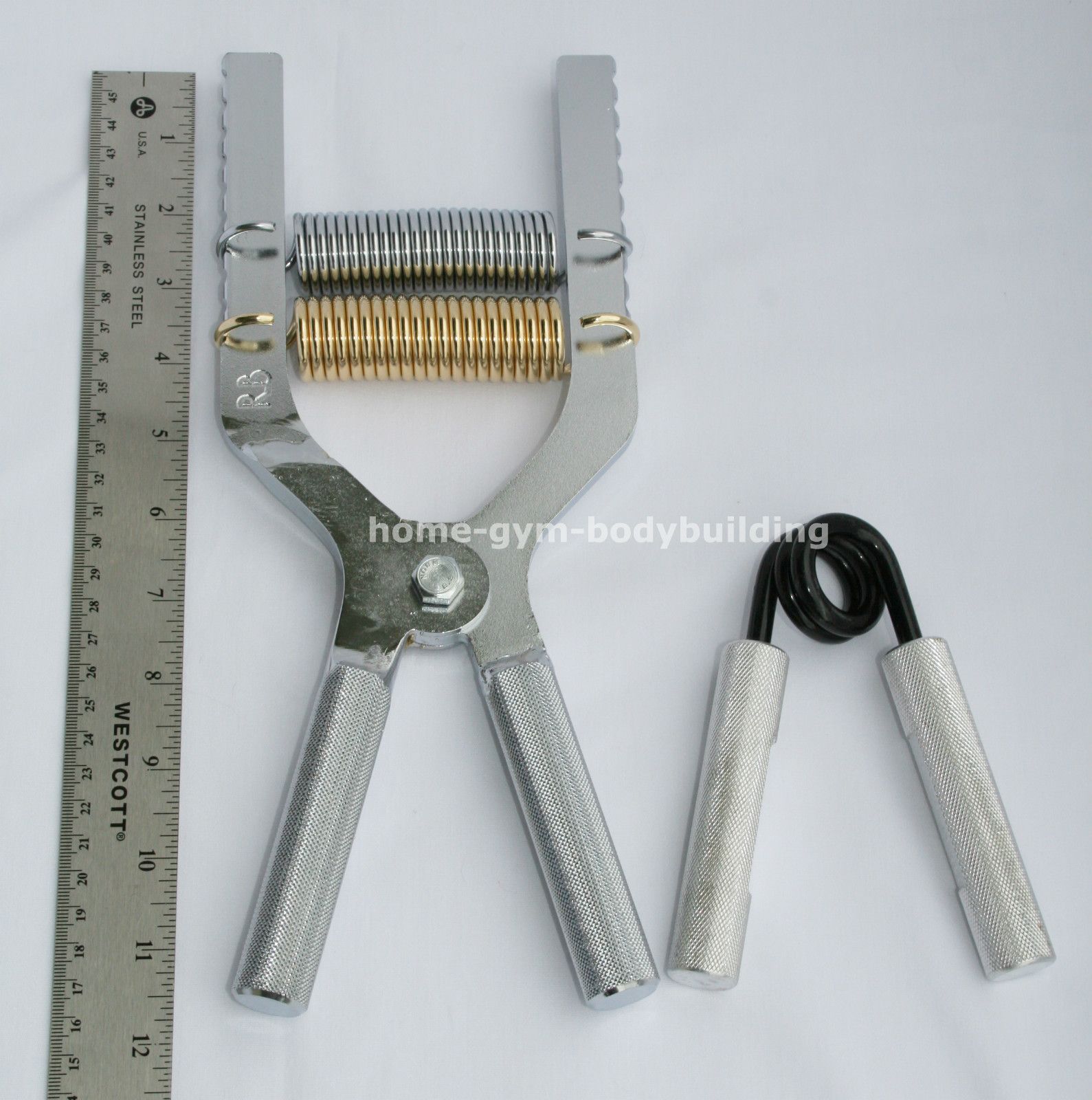 The Robert Baraban RBA Chrome Adjustable gripper compared to a regular 