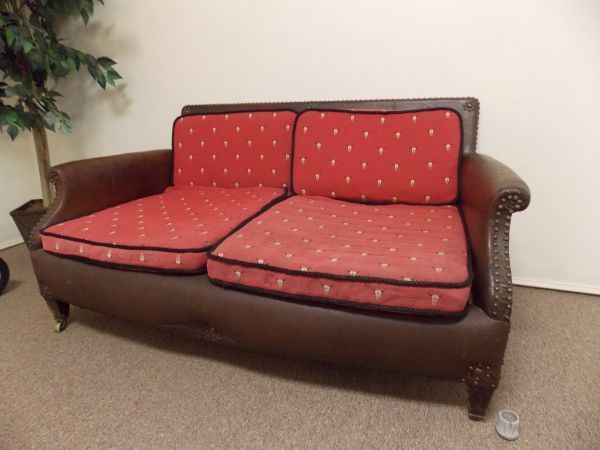    Leather Brown 2 Seated Loveseat with cushions Tampa Brooksville Area