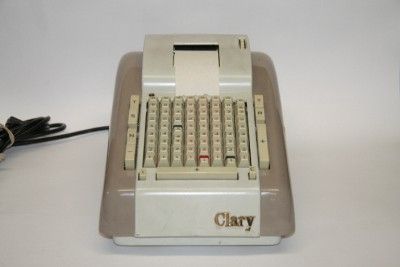 Vintage Clary Adding Machine/Calculator with original cover.