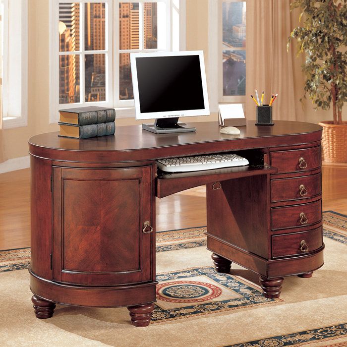  computer desk features a flip down keyboard drawer and CPU storage