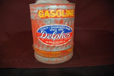 vintage old 1 gallon delphos gas can with lid