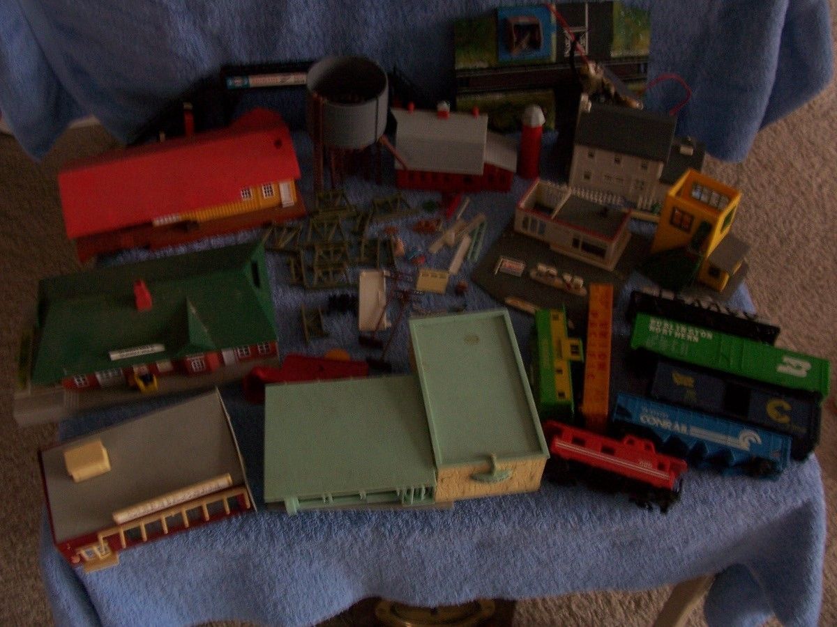   train set huge lot buildings water tower train Exon barn silo pig