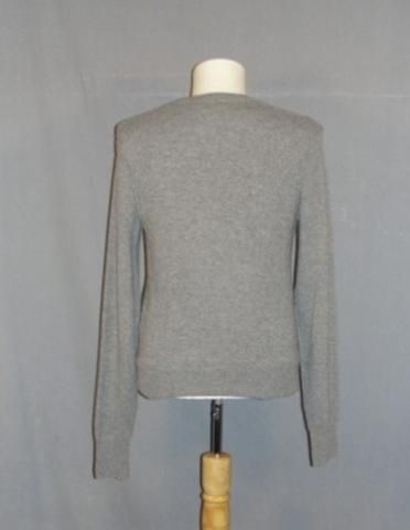 US of Tara Marshall Gregson Keir Gilchrist Screen Worn Vince Sweater