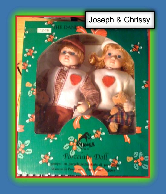 Danea Porcelain Brother & Sister DollsWITH THEIR COAS HANGING FROM