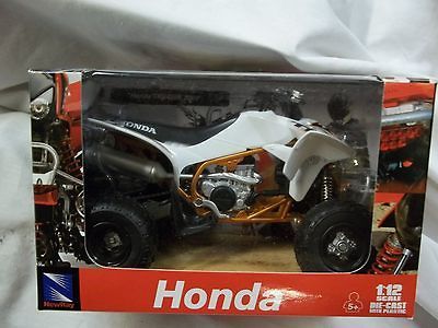 2009 NEW RAY 1/12 SCALE HONDA ATV QUAD TRX450R WHITE WITH A GOLD FRAME